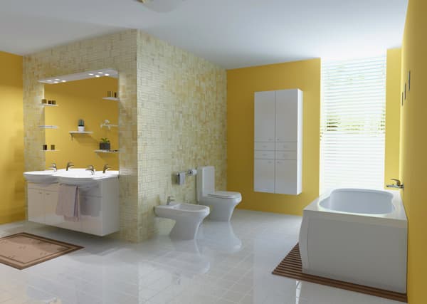 Bright modern bathroom with a white bathtub, vanity and yellow accent walls