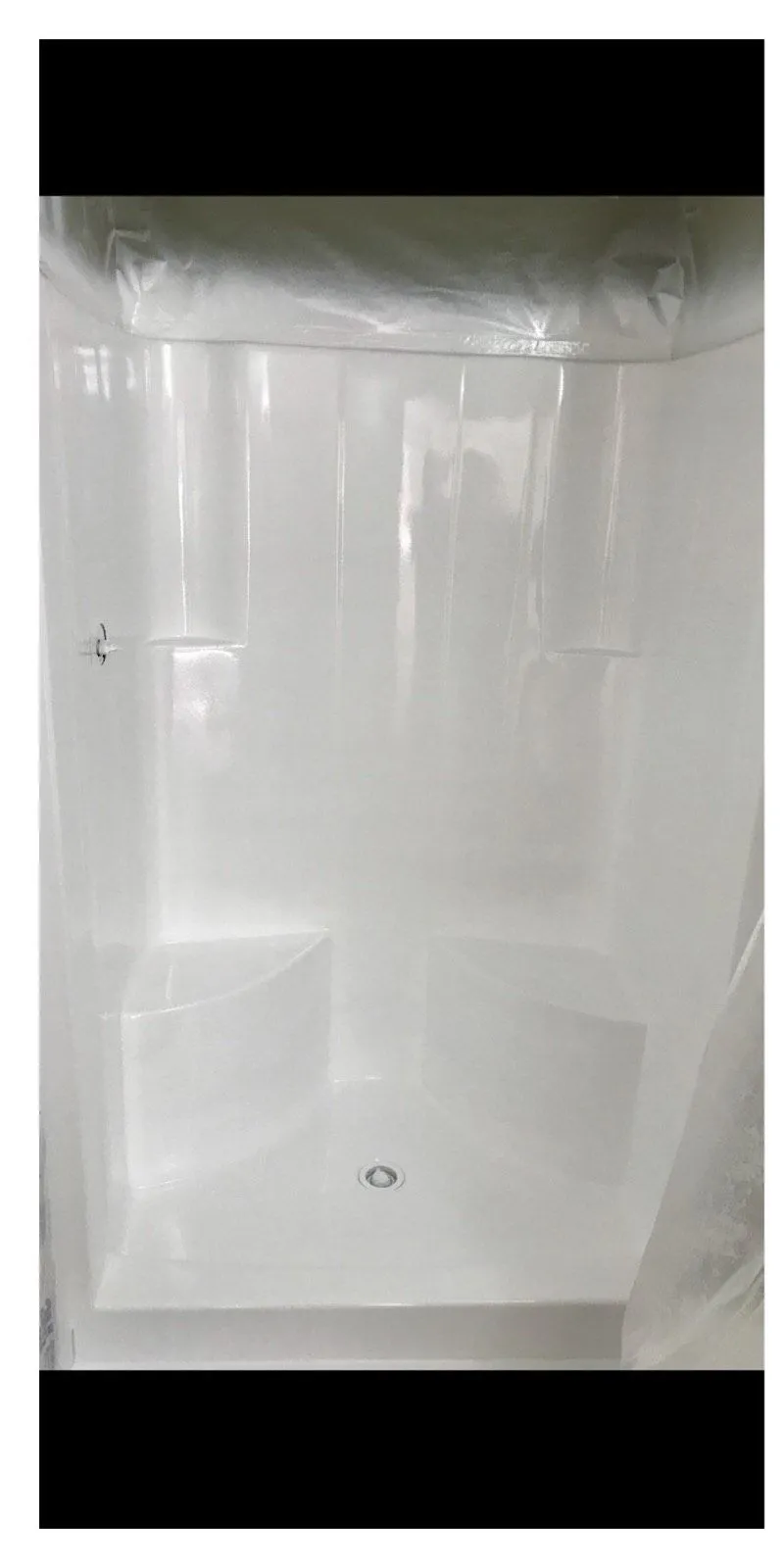 After: Mold damaged shower and surround before refinishing beside the same shower refinished in clean white