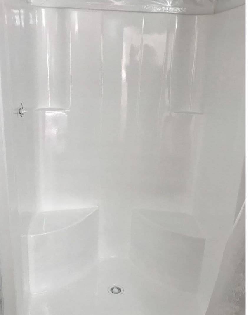 Same tile shower stall after white refinishing